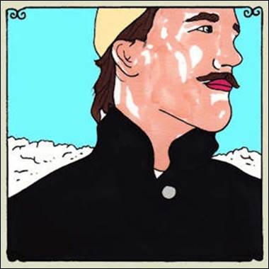 A person with a mustache

Description automatically generated