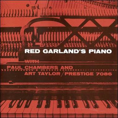 A red piano with white text

Description automatically generated