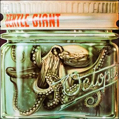 A glass jar with a picture of octopus

Description automatically generated