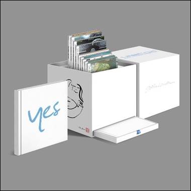 A white box with a box of cd's

Description automatically generated
