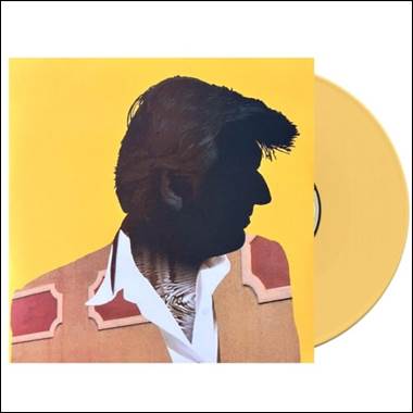 A yellow cd with a person's face

Description automatically generated