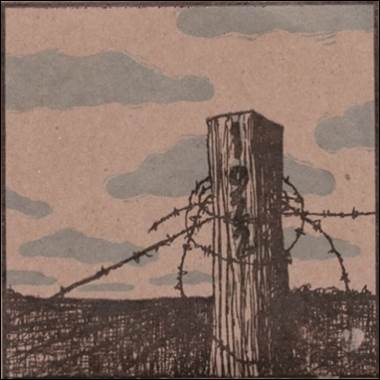 A wood post with barbed wire

Description automatically generated