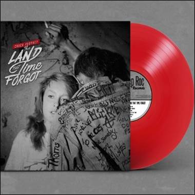 A red vinyl record with a cover

Description automatically generated