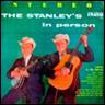 Two men playing instruments on a cover

Description automatically generated