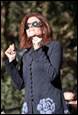 A person with red hair wearing sunglasses

Description automatically generated with low confidence