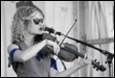A person playing a violin

Description automatically generated with medium confidence