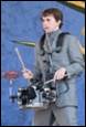 A person playing a drum set

Description automatically generated with low confidence