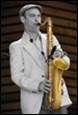 A person playing a saxophone

Description automatically generated with medium confidence