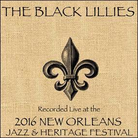 A black fleur-de-lis logo on a tan fabric surface
Description automatically generated