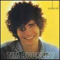 A person with curly hair smiling

Description automatically generated