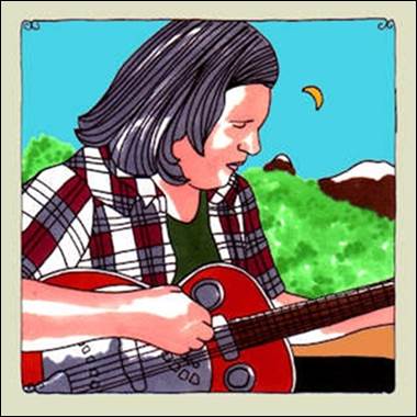 A person playing a guitar

Description automatically generated