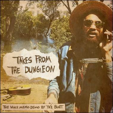 A person with a beard and sunglasses talking on a cell phone

Description automatically generated