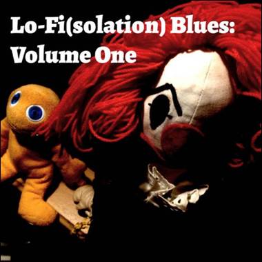 A stuffed toy clown with red hair and a yellow doll

Description automatically generated