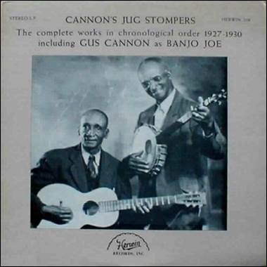 A person playing a banjo and a person playing a banjo

Description automatically generated