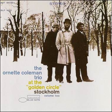 A group of men standing in the snow

Description automatically generated