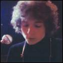 A person with curly hair

Description automatically generated