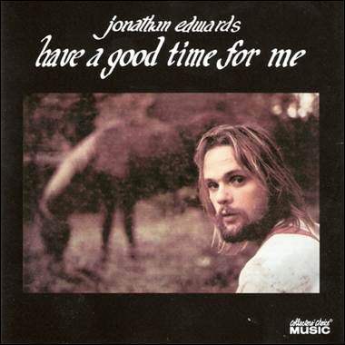 A person with long hair and a horse

Description automatically generated