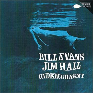 A person swimming under water
Description automatically generated