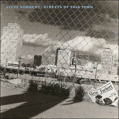 A sign on the ground behind a fence

Description automatically generated