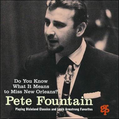 A person in a suit
Description automatically generated