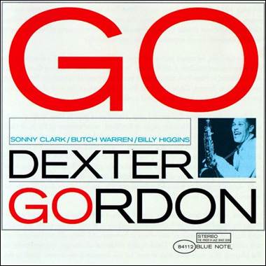 A white cover with red text and a person holding a guitar

Description automatically generated