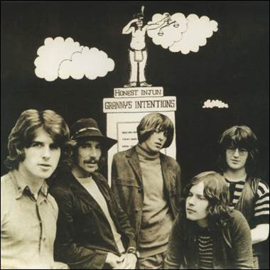 A group of men posing for a photo

Description automatically generated