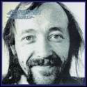 A person with a beard and mustache

Description automatically generated