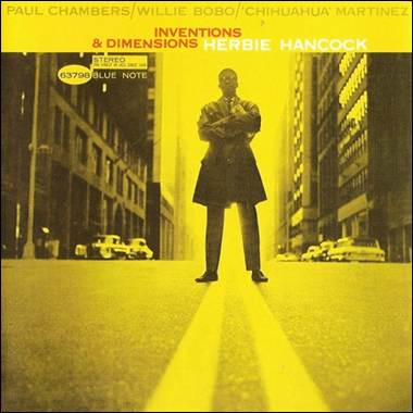 A person standing on a road
Description automatically generated