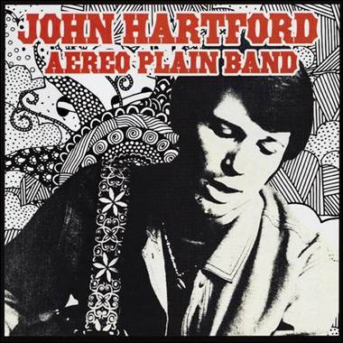 A person with a guitar
Description automatically generated