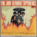 A group of men standing under an umbrella

Description automatically generated