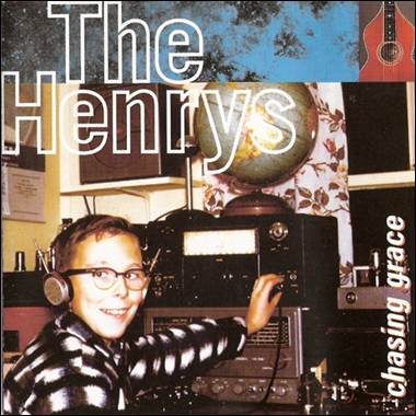 A child wearing headphones and smiling
Description automatically generated