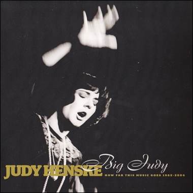 A person with her hands up

Description automatically generated