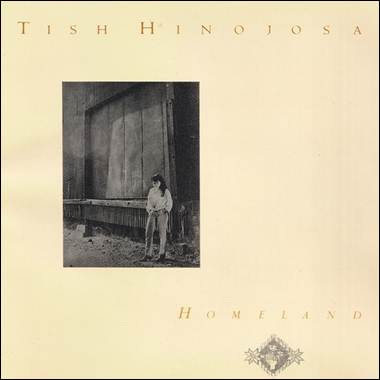 A person standing in front of a window

Description automatically generated