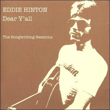 A person holding a guitar
Description automatically generated