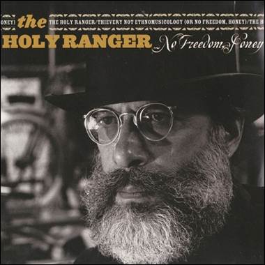 A person with a beard and glasses
Description automatically generated