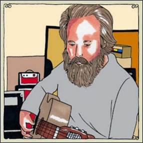 A person playing a guitar
Description automatically generated