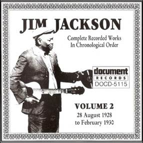 A person holding a guitar
Description automatically generated