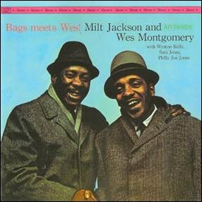 A couple of men wearing hats
Description automatically generated