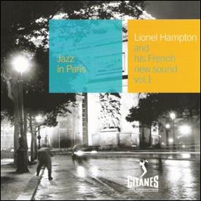 A cd cover of a city street
Description automatically generated