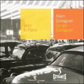 A group of cars in a street
Description automatically generated