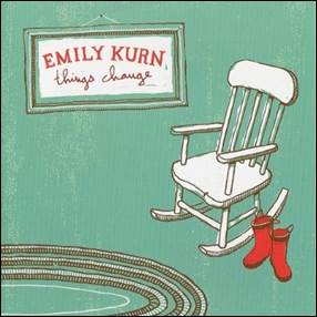 A rocking chair and red boots
Description automatically generated