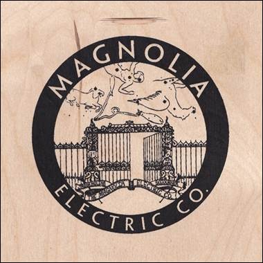 A logo on a wood surface

Description automatically generated