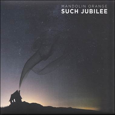 A house with smoke coming out of it
Description automatically generated