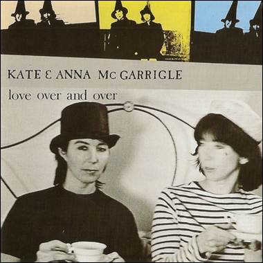 A couple of women sitting in a chair

Description automatically generated