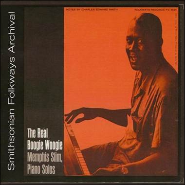 A person sitting on a piano
Description automatically generated