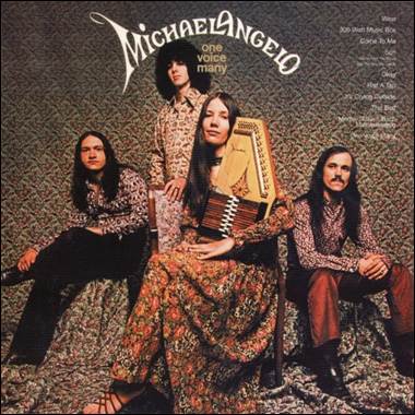 A group of men sitting and posing for a photo
Description automatically generated