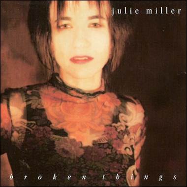 A person in a floral dress
Description automatically generated