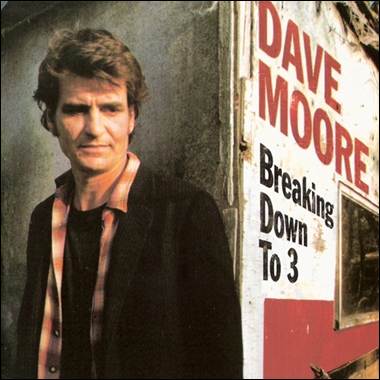 A person standing in front of a sign
Description automatically generated