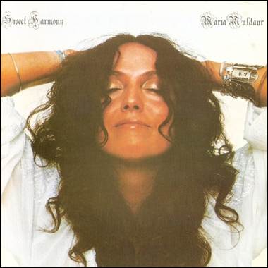 A person with her eyes closed
Description automatically generated