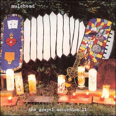 A group of candles and art
Description automatically generated